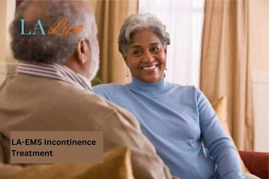 Couple sat smiling at each other - LA-EMS treatment Great Barr