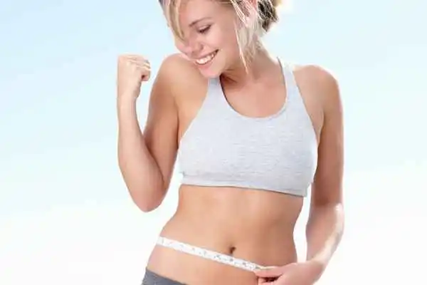 woman happy after fat reduction treatment Great Barr