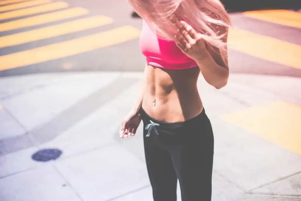 Woman with toned stomach after LA-EMS Body Sculpting Treatment Great Barr